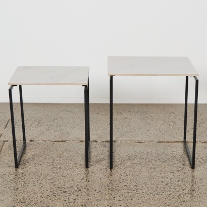 A Pair of Marble Finish Nesting Tables