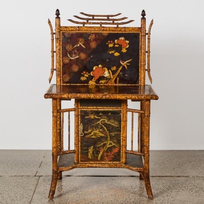 An Aesthetic Movement Bamboo Cabinet with Painted Panels, late 19th century