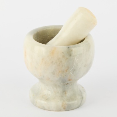 A Marble Mortar And Pestle