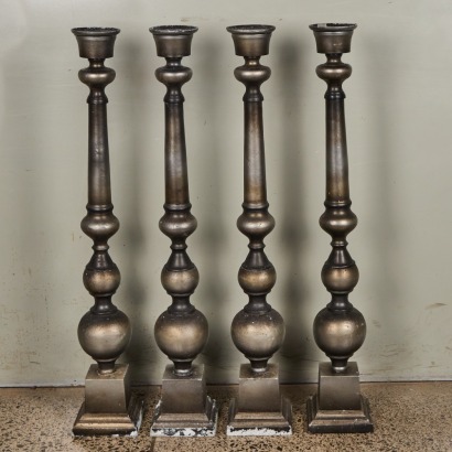A Set of Four Large Cast Candlesticks