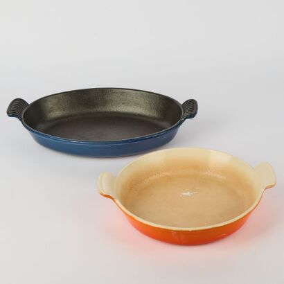 A Pair of Cast Iron Oven Dishes One Vintage By Cousanges Pre Le Creuset And One Modern Unbranded
