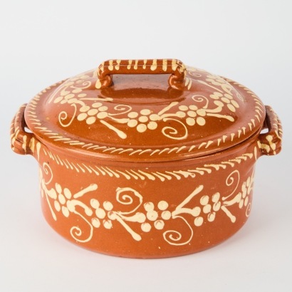 A Portuguese Earthenware Casserole Dish with Slip-Trail Decoration