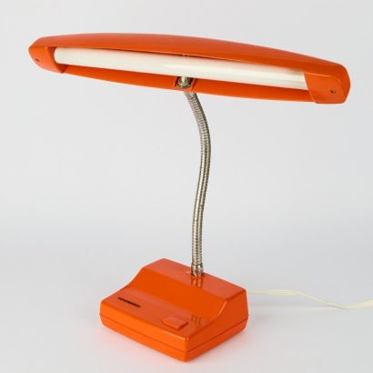 A Hanimex Orange Plastic Fluoro Tube Desk Lamp