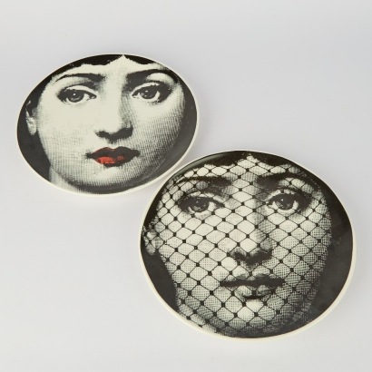 A Pair of Fornasetti Style Decorative Plates
