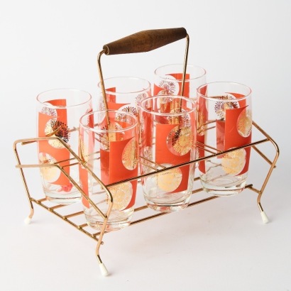 An Atomic Starburst Pattern Barware Set of Six Glasses on Stand