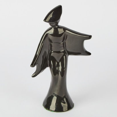 A 1960s Black Ceramic Figure of a Dancing Asian Woman