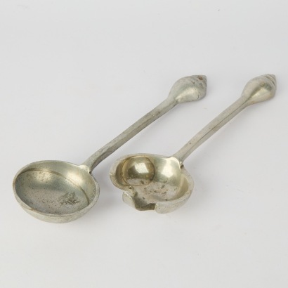 A Pair of Spiral Shell Decorated Aluminium Salad Servers