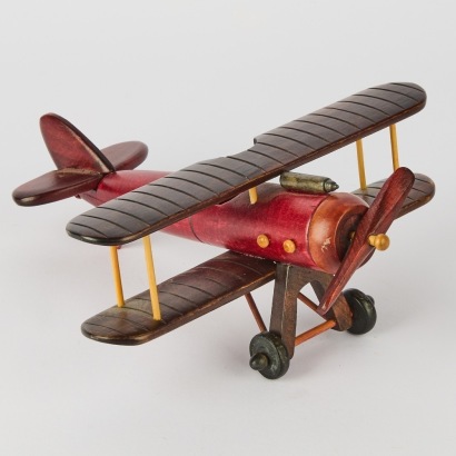 A Wooden Toy Biplane with Polychrome Stain Finish