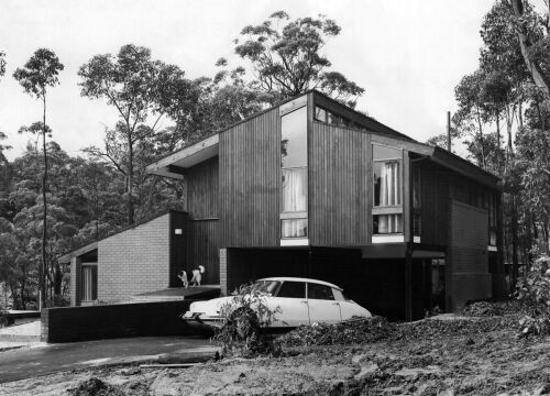 MAX DUPAIN A split level project house features oiled timber and full length glass, both reflecting the natural bushland setting