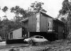 MAX DUPAIN A split level project house features oiled timber and full length glass, both reflecting the natural bushland setting