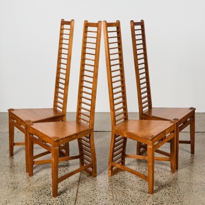 A Set of Four Solid Teak Ladder Back Chairs