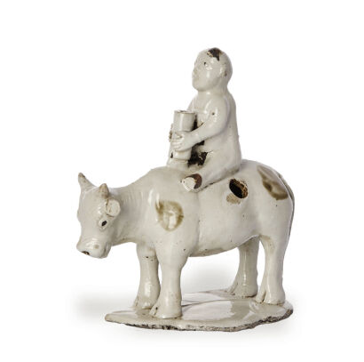 A Chinese Song Dynasty Spotted White Porcelain Incense Burner (depicting a boy riding a bull)