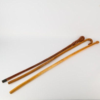 A Trio of Hand carved African Walking Sticks