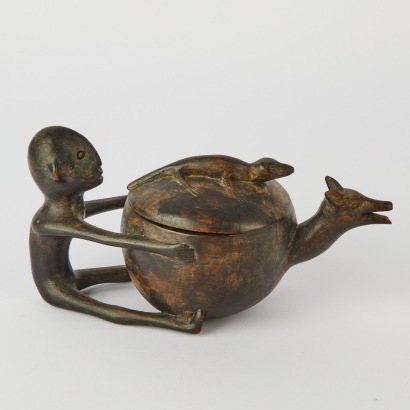 An Amusing Carved Pot featuring a Man Dog and a Lizard