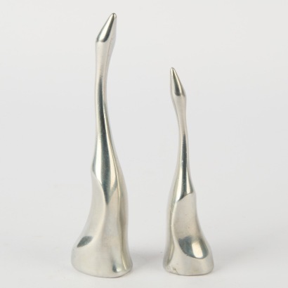 A Pair of Stelton No. 116 & 117 Cast Metal Swan Ornaments