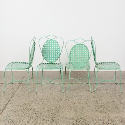 A Set of Four Vintage Green Wrought Iron Outdoor Chairs
