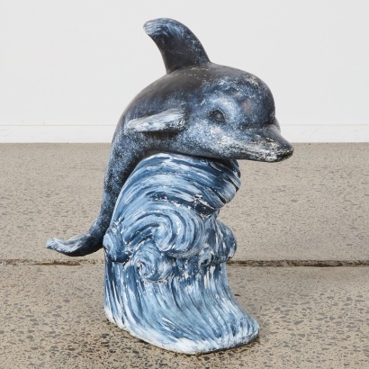 A Concrete Dolphin Garden Statue
