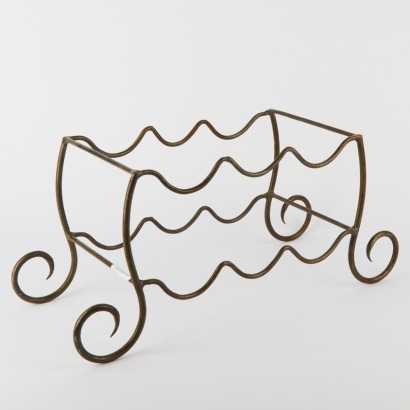 A Wrought Iron Wine Rack