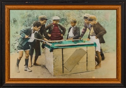 A Hand Coloured Photo of Boys Playing Pool