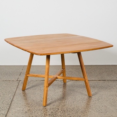 An Ercol Mid Century Drop Leaf Table in Elm Wood
