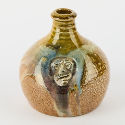 A Mark Goody Carafe with Face Decoration