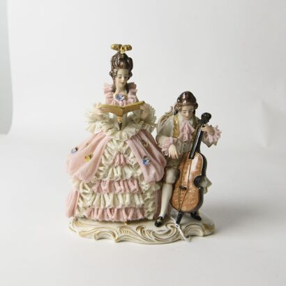A German Porcelain Figure of a Cello Player