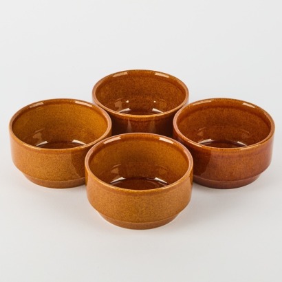 A Set of Four Crown Lynn Pioneer Glaze Bowls