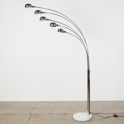 A Medusa Five Style Lamp With A Marble Base