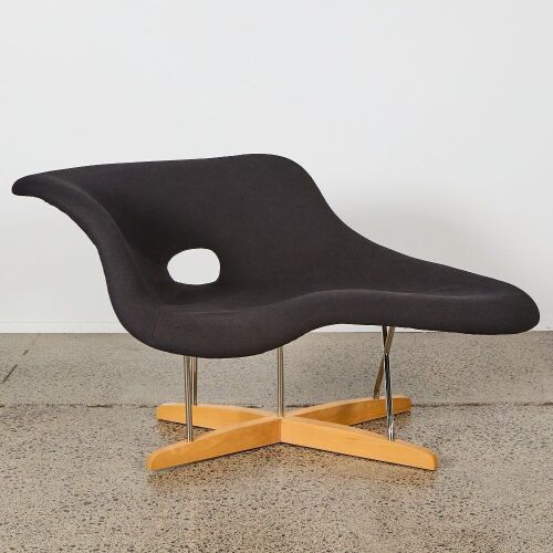 An Eames-Style &ldquo;La Chaise&rdquo; Black Upholstered Lounge Chair