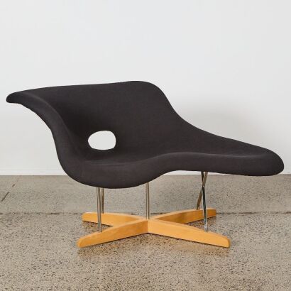 An Eames-Style &ldquo;La Chaise&rdquo; Black Upholstered Lounge Chair