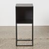 A Small Black Minimalist Design Metal Cabinet