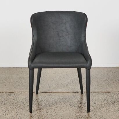 An Occasional Chair in Black Vegan Leather by Coco Republic