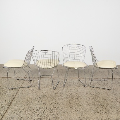A Set of Four Bertoia Style Dining Chairs