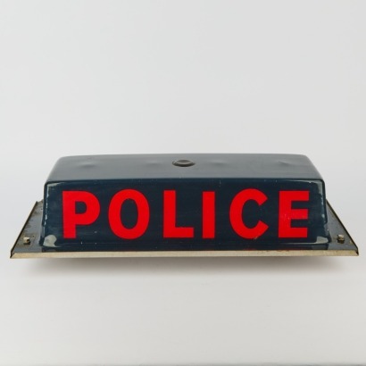 A Vintage Police Car Sign