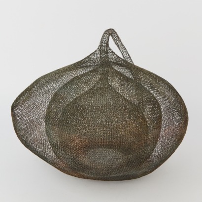 A Wire Lamp Shade with Concentric Forms