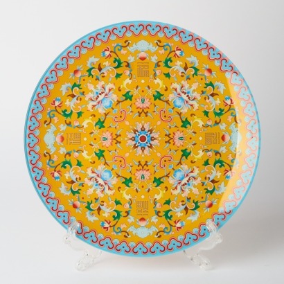 A Decorative Plate on Display Stand