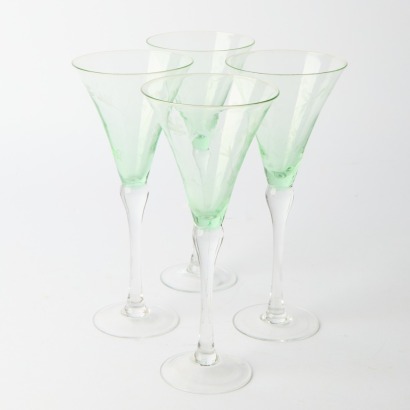 A Set of Four Etched French Country Champagne Flutes