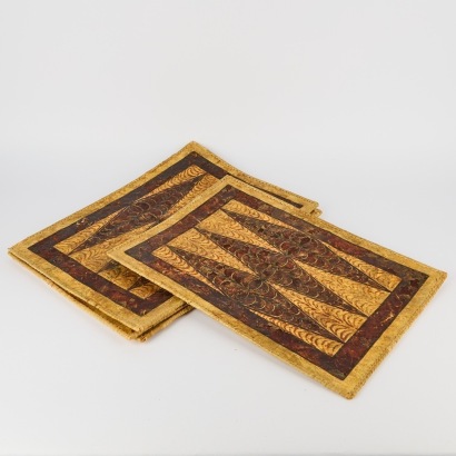 A Set of Four Wooven Place Matts