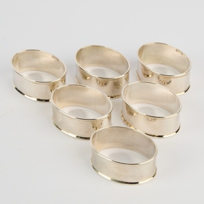 A Set of Six Walker and Hall Sterling Silver Serviette Rings
