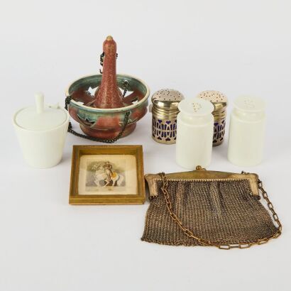 A Group of Condiment Containers and Small Objects