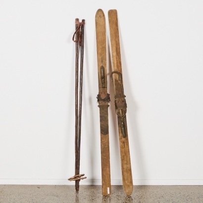 A Pair of Vintage Childs Skis And Poles
