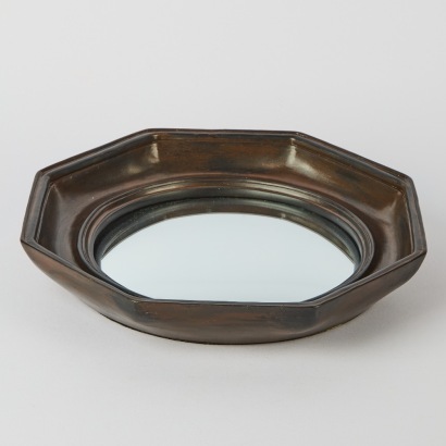 A Small Convex Mirror Wall Hanging