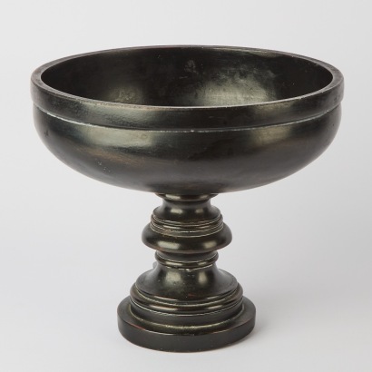 A Black Footed Fruit Bowl