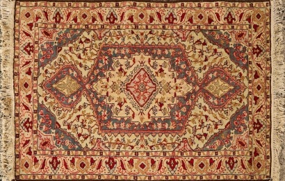A Vintage Handwoven Tabriz Rug