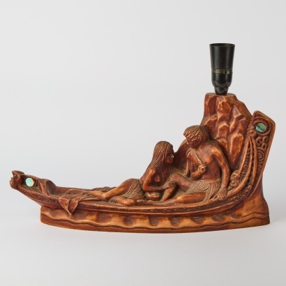 A Vintage Resin Table Lamp in the Form of Two Māori Figures in a Waka
