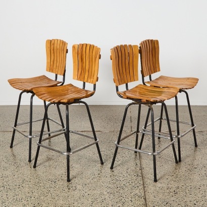 A Set of Four Arthur Umanoff Style Swivel Chairs