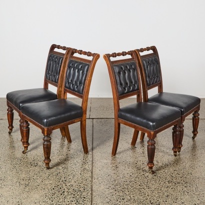 A Set of Four Colonial Kauri and Leather Chairs
