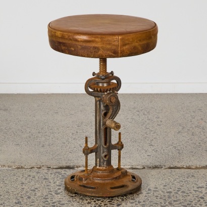 An Iron Leather Topped Stool