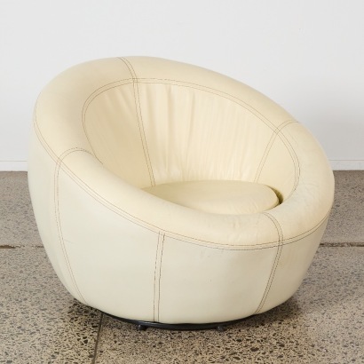 A White Leather Swivel Tub Chair