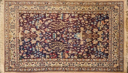 An Ornate Vintage Fringed Rug